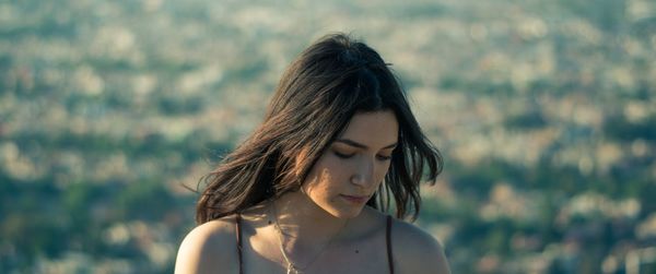 Portrait of young woman outdoors