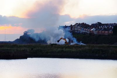 Digger dealing with a fire