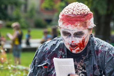 Portrait of young man in park