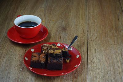 High angle view of coffee cup on table