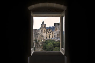 Buildings seen through window