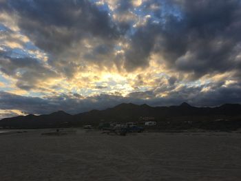 Scenic view of dramatic sky over landscape