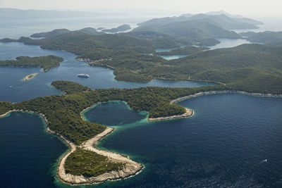 High angle view of sea and mountains