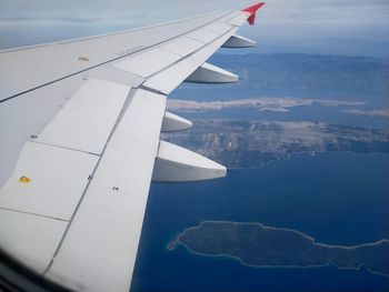 Aerial view of airplane flying over landscape