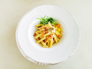 High angle view of pasta in plate on table