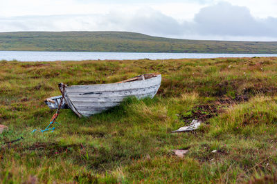 Abandoned boat on the track to sandwood bay beach in north west scotland, nc500, sunny summer day