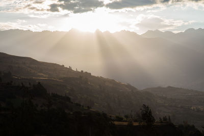 Scenic view of mountains against sky during sunset