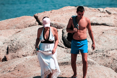 Young couple standing on land