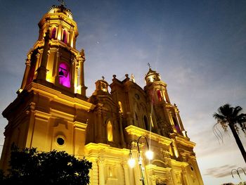 Low angle view of church against blue sky