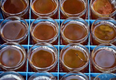 Close-up of drinks in crate