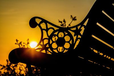 Low angle view of illuminated lamp against sky