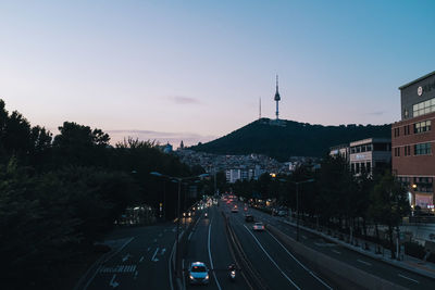 High angle view of city street against clear sky