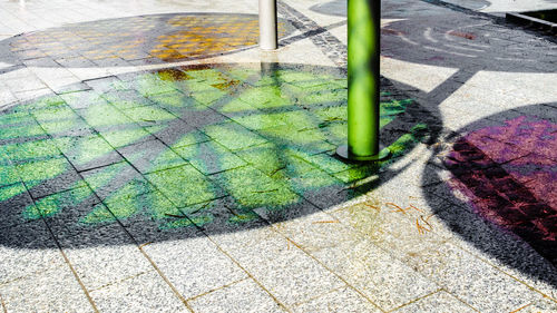 Low section of person shadow on grass