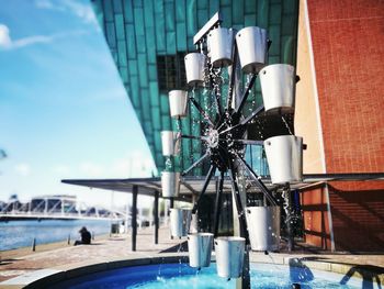 Close-up of built structure against blue sky