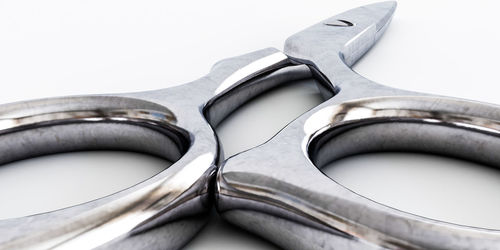 High angle view of machine part against white background