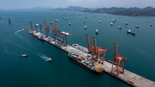 Aerial view bulk carrier dock, global business import export logistic and transportation company,