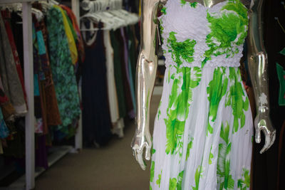 Close-up of clothes hanging on display at store