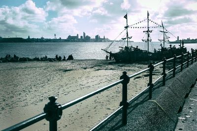 Pier over sea against sky