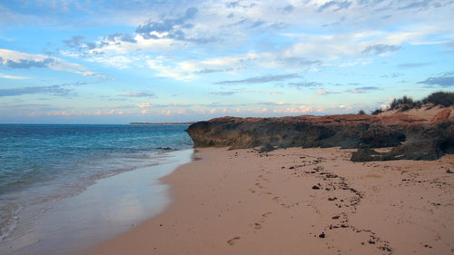 Scenic view of beach against sky