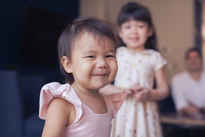 Portrait of cute girl smiling