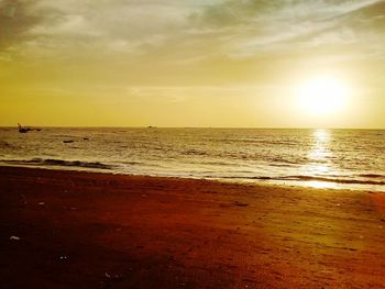 Scenic view of sea at sunset