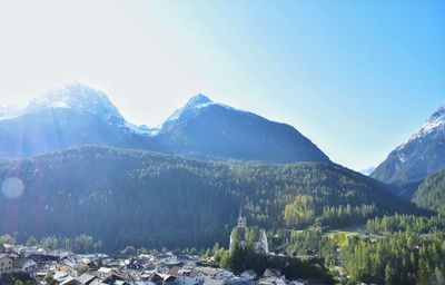 Scenic view of mountains against sky during winter