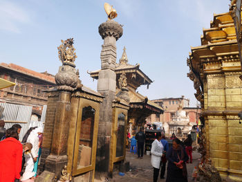 Group of people in front of historical building