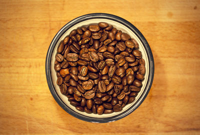 Close-up of coffee beans on table