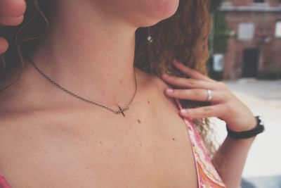 Close-up of shirtless young woman