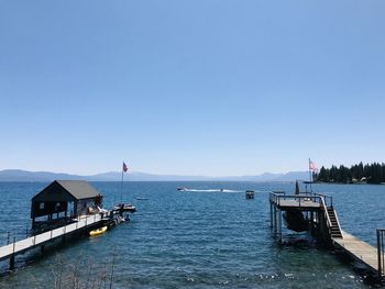 Scenic view of sea against clear blue sky