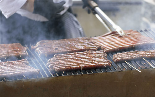 Close-up of meat on barbecue grill