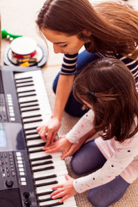 High angle view of women playing at music concert