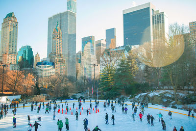 Panoramic view of people in city during winter