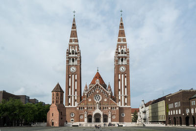 View of buildings in city against sky