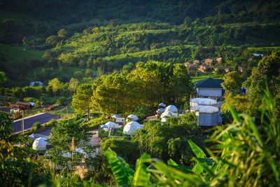 High angle view of townscape by mountain