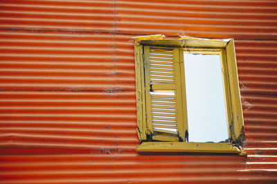 Closed shutter of window of building