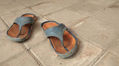 Old and dirty slippers or sandal