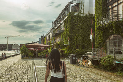 Lady walking at münster hafen harbor in summer