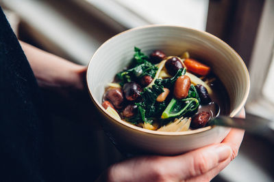 Close-up of hand holding food