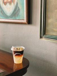 Close-up of coffee cup on table