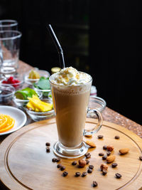 Close-up of coffee served on table