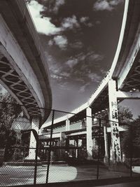 View of bridge against cloudy sky
