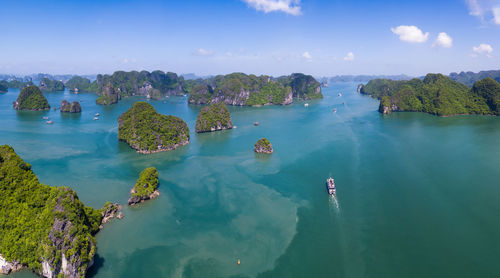 Panoramic view of sea and rocks against sky