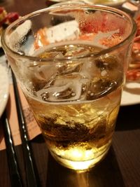 Close-up of beer in glass on table