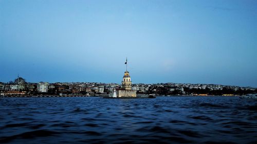 Scenic view of cityscape against clear sky