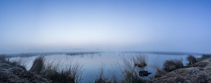 Scenic view of lake against clear sky