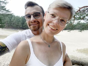 Portrait of smiling young couple