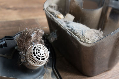 High angle view of cigarette in jar on table