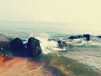 Scenic view of sea against clear sky