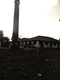 Low angle view of factory against clear sky